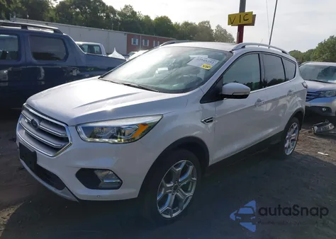 2017 Ford Escape Titanium z USA, uszkodzony, nr VIN 1FMCU9JD3HUD80510